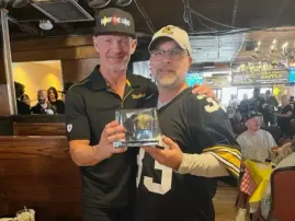 Merril Hoge and Loyal fan